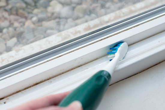 Use electric toothbrush for-cleaning window tracks